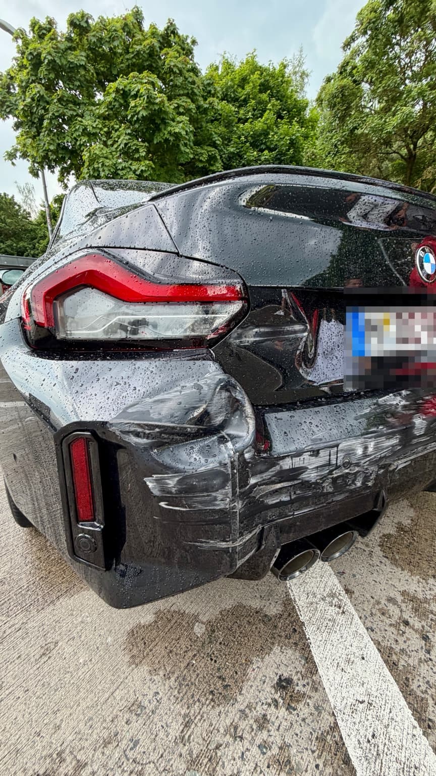 Dokumentierter Heckschaden an einem BMW